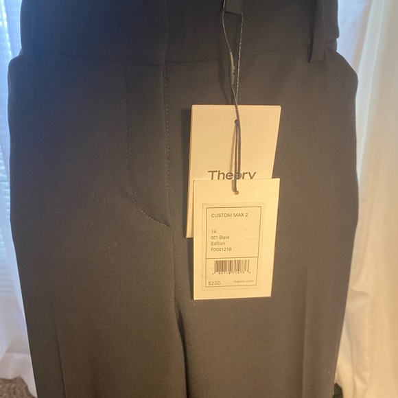 Hook-and-eye closure, belt loops. Off-seam front pockets,small size 14. - Picture 4 of 7